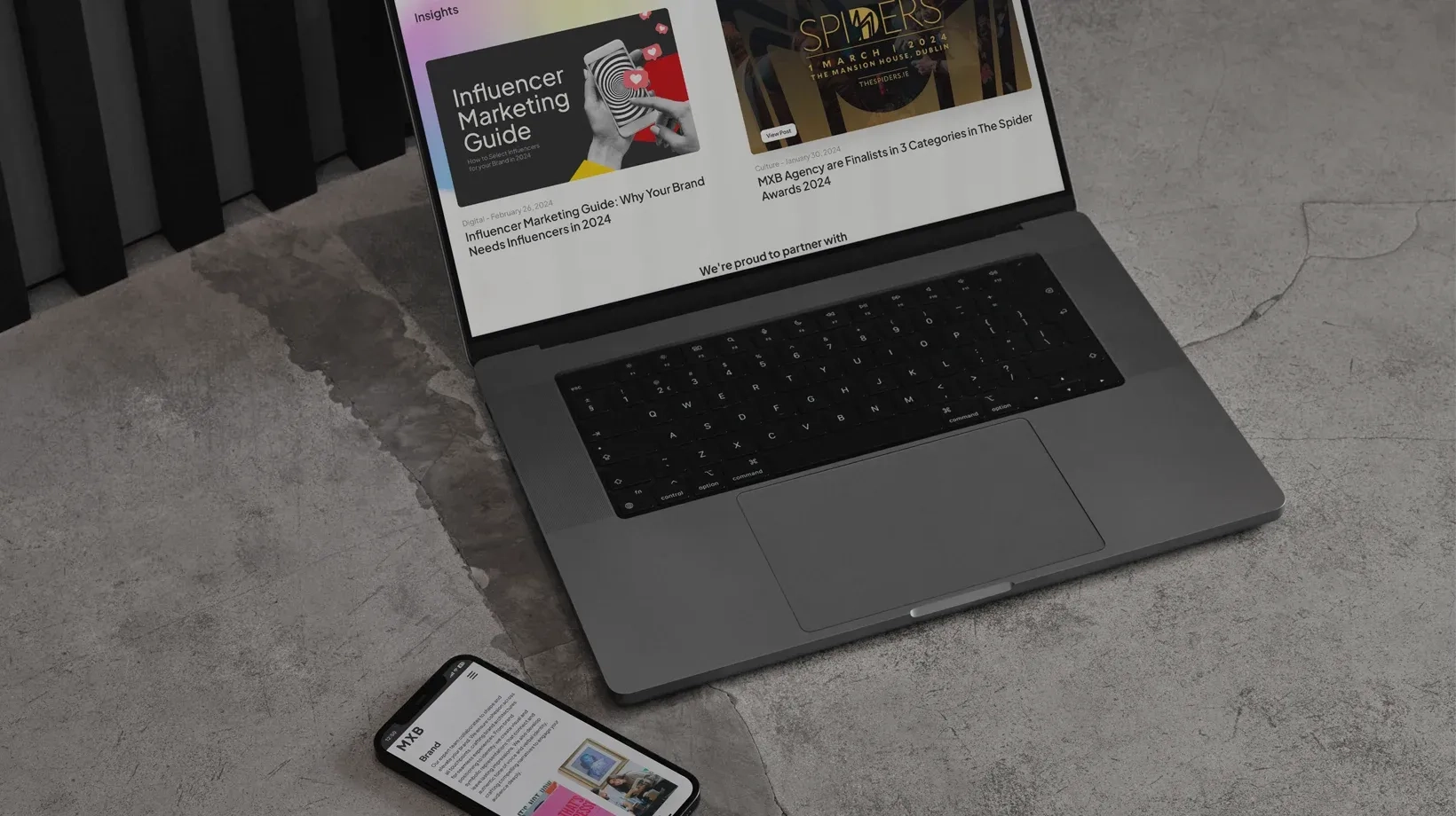 MXB website on MacBook and iPhone